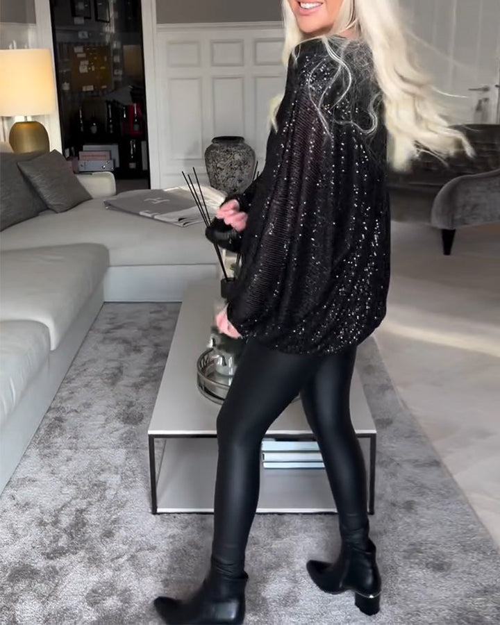 Pailletten-top met ballonmouwen en ronde hals