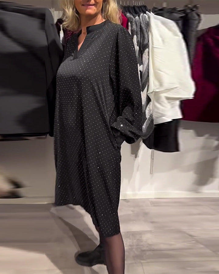 Jurk met lantaenmouwen en ruitpatroon