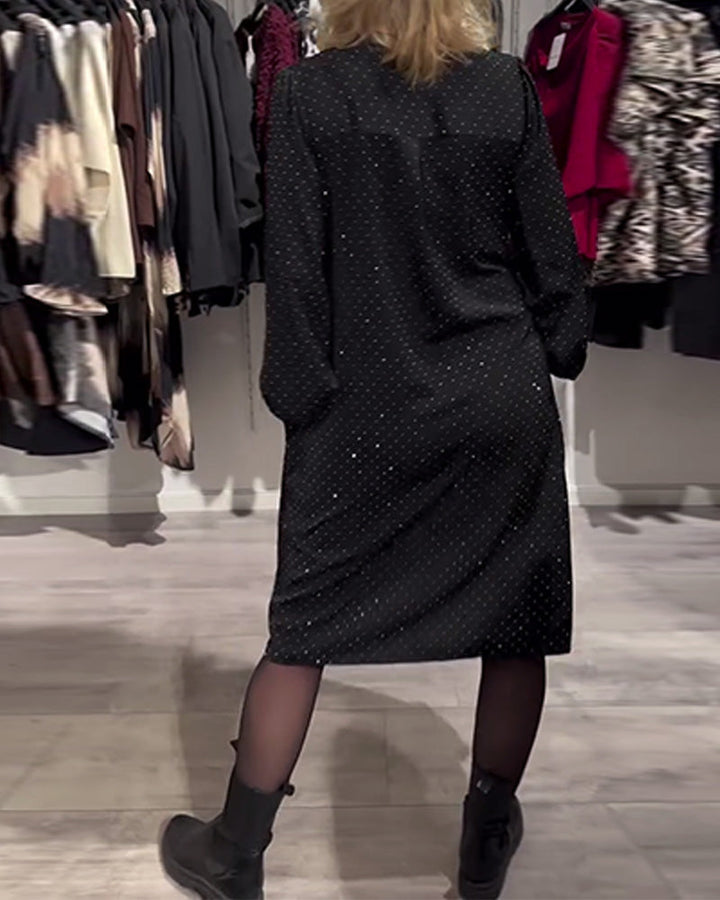 Jurk met lantaenmouwen en ruitpatroon