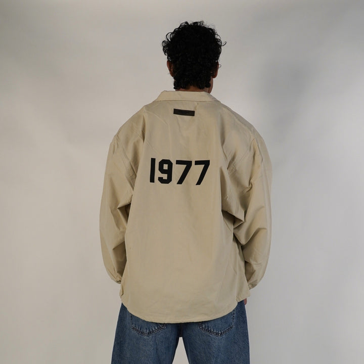 Fear of God Essentials FW20 Coach Jacket 1977 Wheat