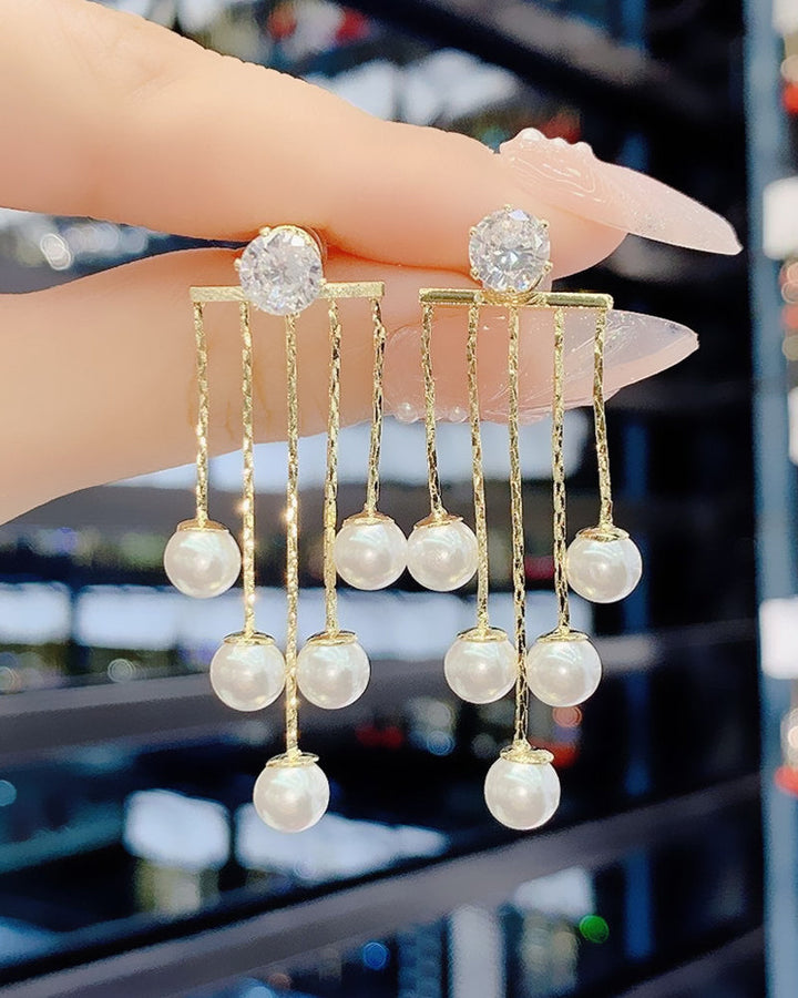 Kwast lange oorbellen