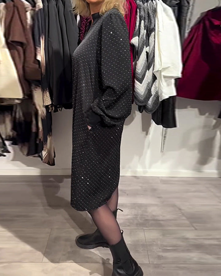 Jurk met lantaenmouwen en ruitpatroon