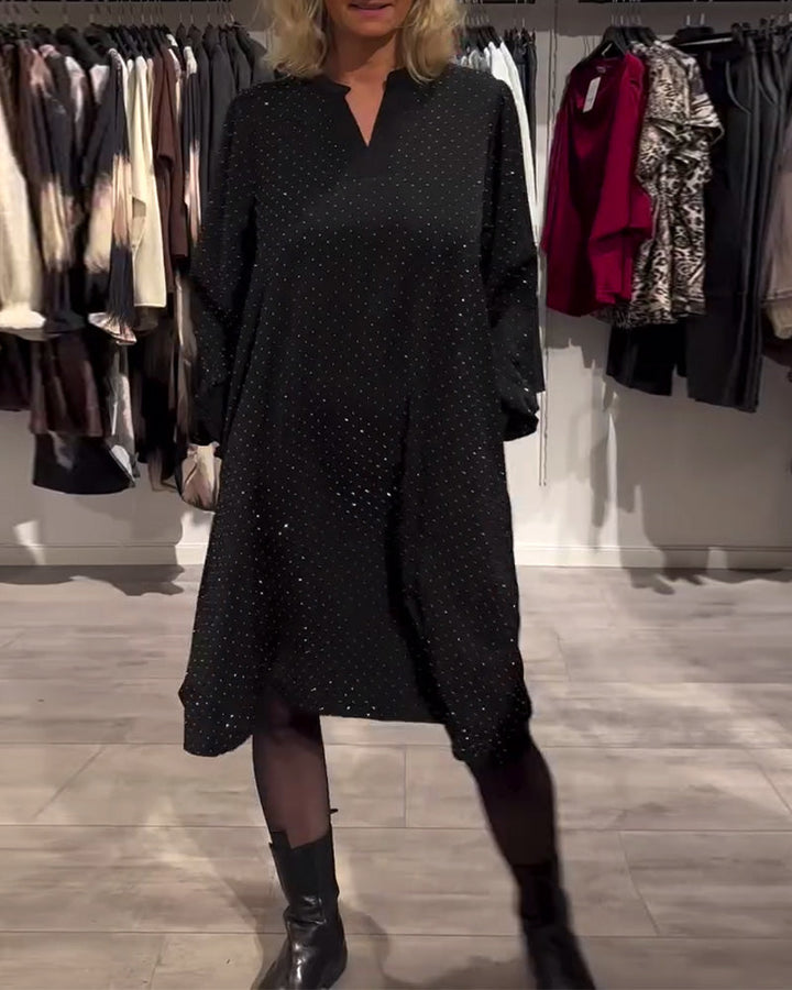 Jurk met lantaenmouwen en ruitpatroon